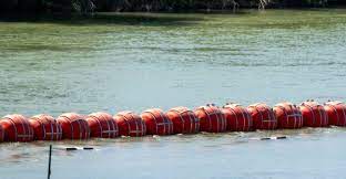 Texas Governor Says He Will Defy Federal Agency’s Request to Remove Floating Barriers