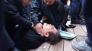 South Korean Opposition Leader Stabbed During Press Conference