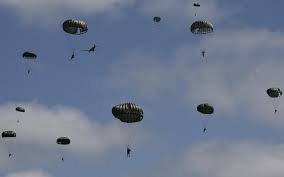 A mass parachute jump over Normandy kicks off commemorations for the 80th anniversary of D-Day