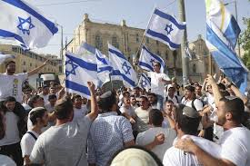 Israeli nationalists march through Palestinian area of Jerusalem, some chanting ‘Death to Arabs’