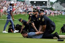 Watch: Police Tackle Climate Protesters Who Disrupted Final Hole At PGA Travelers Championship