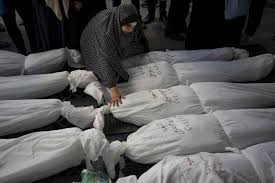 As Gaza death toll passes 40,000, corpses are buried in yards, streets, tiered graves
