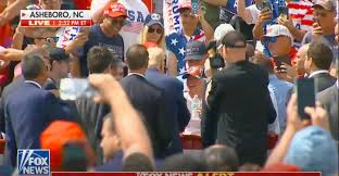 Watch: Trump Immediately Concerned After Woman Collapses at Rally, Rushes Over to Her
