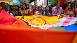 Same-sex couples and LGBTQ+ activists rally in Nepal’s capital during the annual Pride parade