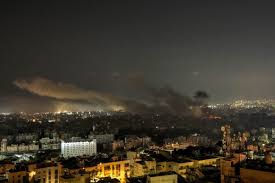 Israel strikes Lebanon, hitting Beirut suburbs and the north