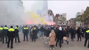 Assailants attack Israeli soccer fans in Amsterdam. The violence was condemned as antisemitic